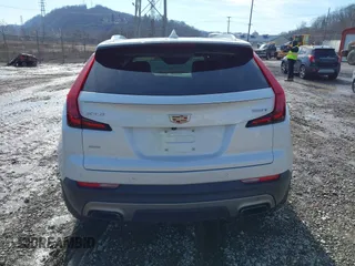 2020 Cadillac XT4 AWD Premium Luxury z VIN 1GYFZDR45LF016381, wystawiony jako IAAI lot #41556874 z przebiegiem 23 887 mil mil oraz . Historia ofert i sprzedaży dostępna na DreamBid. Obrazek 16.