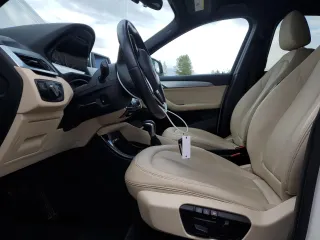 2016 BMW X1 xDrive28i z VIN WBXHT3C37GP882189, wystawiony jako Copart lot #56983985 z przebiegiem 45 700 mil mil oraz Szkoda całkowita • Salvage title. Historia ofert i sprzedaży dostępna na DreamBid. Obrazek 7.