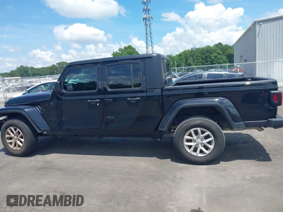 2023 Jeep Gladiator Sport S with VIN 1C6HJTAGXPL543319, listed as a IAAI auction lot 42499587 with 45,140 mi miles and . Bid and sale history available at DreamBid. Image 14.