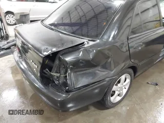 2003 Mazda Protege DX with VIN JM1BJ226431112902, listed as a IAAI auction lot 41939907 with 184,618 mi miles and . Bid and sale history available at DreamBid. Image 19.