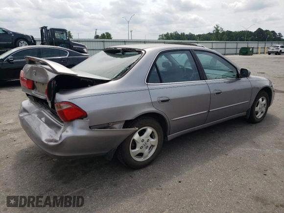 2000 Honda Accord EX z VIN 1HGCG5656YA060963, wystawiony jako Copart lot #54715235 z przebiegiem 266 918 mil mil oraz Szkoda całkowita • Salvage title. Historia ofert i sprzedaży dostępna na DreamBid. Obrazek 3.
