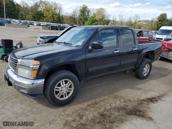2011 GMC Canyon SLE1 with VIN 1GTH6MFE8B8102114, listed as a Copart auction lot 74137234 with 150,598 mi miles and Salvage Title. Bid and sale history available at carsss.com. Image 1.