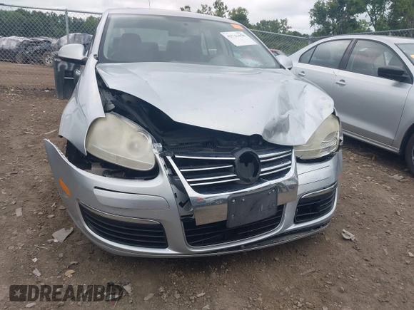 2007 Volkswagen Jetta Wolfsburg Edition z VIN 3VWEF71K77M166713, wystawiony jako IAAI lot #42746458 z przebiegiem 214 241 mil mil oraz . Historia ofert i sprzedaży dostępna na DreamBid. Obrazek 6.