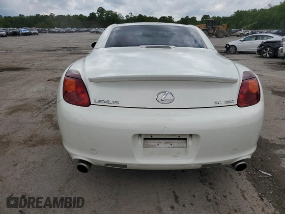 2002 Lexus SC 430 z VIN JTHFN48Y420010870, wystawiony jako Copart lot #58817105 z przebiegiem 131 964 mil mil oraz Szkoda całkowita • Salvage title. Historia ofert i sprzedaży dostępna na DreamBid. Obrazek 6.