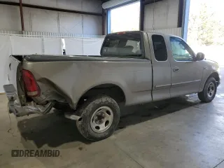 2003 Ford F-150 XL with VIN 1FTRX17283NA46215, listed as a Copart auction lot 85194094 with 168,415 mi miles and Salvage title. Bid and sale history available at DreamBid. Image 3.