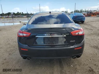 2015 Maserati Ghibli with VIN ZAM57XSA2F1129792, listed as a Copart auction lot 70717393 with 116,851 mi miles. Bid and sale history available at carsss.com. Image 6.