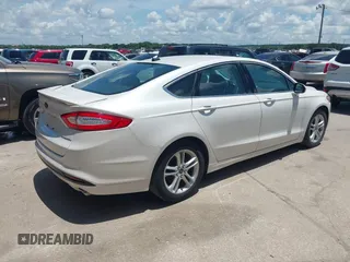 2016 Ford Fusion Titanium with VIN 3FA6P0SU5GR120687, listed as a IAAI auction lot 42571006 with 143,210 mi miles and . Bid and sale history available at DreamBid. Image 4.