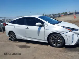 2021 Toyota Prius L Eco с VIN JTDKAMFU5M3142128, выставлен на аукционе IAAI как лот 42481468 с пробегом 28 152 миль миль и . История ставок и продаж доступна на DreamBid. Изображение 13.