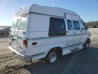 1994 Chevrolet Chevy Van z VIN 1GBEG25KXRF155175, wystawiony jako Copart lot #46681995 z przebiegiem 217 446 mil mil oraz Szkoda całkowita • Salvage title. Historia ofert i sprzedaży dostępna na DreamBid. Obrazek 3.