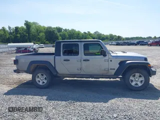 2020 Jeep Gladiator Sport S with VIN 1C6HJTAG7LL128940, listed as a IAAI auction lot 42108154 with 90,596 mi miles and . Bid and sale history available at DreamBid. Image 13.