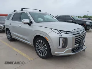 2023 Hyundai Palisade Calligraphy z VIN KM8R74GE5PU551034, wystawiony jako IAAI lot #42093625 z przebiegiem 99 448 mil mil oraz . Historia ofert i sprzedaży dostępna na DreamBid. Obrazek 1.