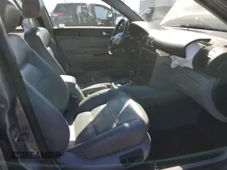 2004 Volkswagen Passat GLX z VIN WVWRH63B14P058955, wystawiony jako Copart lot #75076284 z przebiegiem 160 844 mil mil oraz Czysty tytuł • Clean title. Historia ofert i sprzedaży dostępna na DreamBid. Obrazek 7.