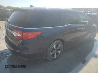 2019 Honda Odyssey Touring with VIN 5FNRL6H80KB100678, listed as a Copart auction lot 58155715 with Not provided miles and Salvage title. Bid and sale history available at DreamBid. Image 3.