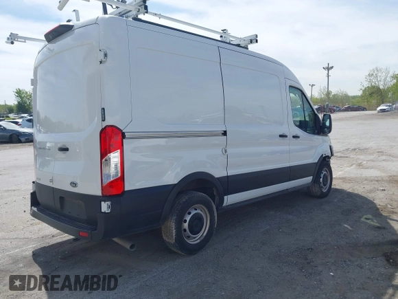 2023 Ford Transit Cargo z VIN 1FTYE1CG2PKB14938, wystawiony jako IAAI lot #41964017 z przebiegiem 6 902 mil mil oraz . Historia ofert i sprzedaży dostępna na DreamBid. Obrazek 4.