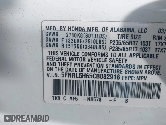 2012 Honda Odyssey EX-L with VIN 5FNRL5H65CB082916, listed as a IAAI auction lot 42052713 with 217,267 mi miles and . Bid and sale history available at carsss.com. Image 9.