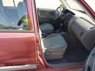 2003 Suzuki Vitara z VIN 2S3TE52V236103499, wystawiony jako IAAI lot #42285161 z przebiegiem 97 533 mil mil oraz . Historia ofert i sprzedaży dostępna na DreamBid. Obrazek 5.