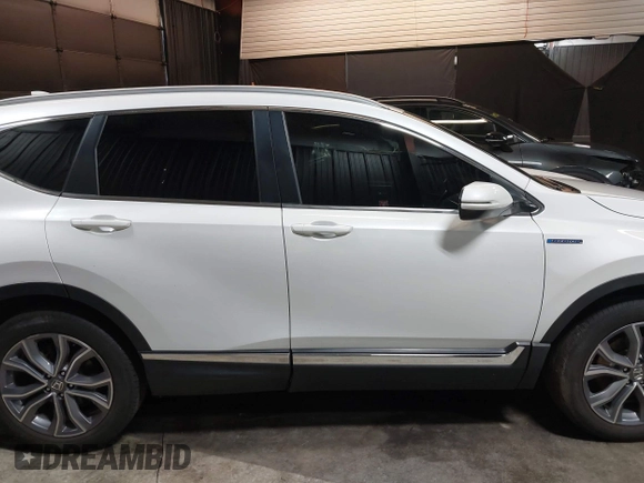 2021 Honda CR-V Touring with VIN 7FART6H98ME024238, listed as a IAAI auction lot 42341911 with 50,757 mi miles and . Bid and sale history available at DreamBid. Image 13.