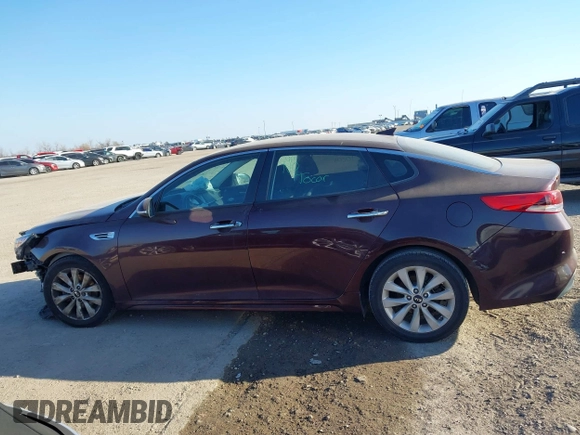 2016 Kia Optima LX z VIN 5XXGT4L36GG001942, wystawiony jako IAAI lot #41236894 z przebiegiem 125 376 mil mil oraz . Historia ofert i sprzedaży dostępna na DreamBid. Obrazek 14.