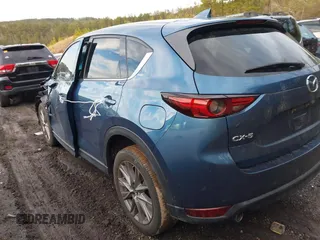 2020 Mazda CX-5 Grand Touring with VIN JM3KFADM4L0827733, listed as a IAAI auction lot 41482517 with 43,597 mi miles. Bid and sale history available at carsss.com. Image 3.