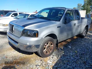 2005 Ford F-150 STX with VIN 1FTRX12W95NB42772, listed as a IAAI auction lot 41826733 with 224,266 mi miles. Bid and sale history available at carsss.com. Image 2.