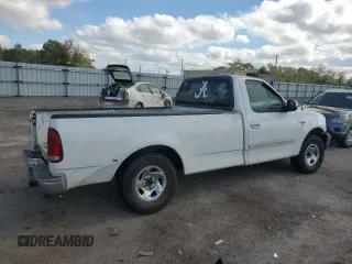 1999 Ford F-150 z VIN 1FTRF17W9XNB67119, wystawiony jako Copart lot #79197414 z przebiegiem Nie podano mil oraz Szkoda całkowita • Salvage title. Historia ofert i sprzedaży dostępna na DreamBid. Obrazek 3.