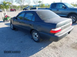 1997 Toyota Corolla with VIN 1NXBA02EXVZ634474, listed as a IAAI auction lot 41492504 with 147,080 mi miles and . Bid and sale history available at DreamBid. Image 3.