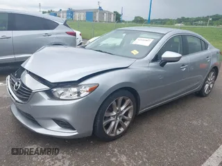 2016 Mazda 6 i Touring with VIN JM1GJ1V57G1434250, listed as a IAAI auction lot 42241857 with 68,011 mi miles and . Bid and sale history available at DreamBid. Image 2.