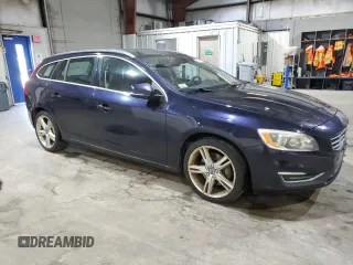 2016 Volvo V60 T5 Premier z VIN YV1612SK2G1309887, wystawiony jako Copart lot #59885775 z przebiegiem 139 271 mil mil oraz Czysty tytuł • Clean title. Historia ofert i sprzedaży dostępna na DreamBid. Obrazek 4.