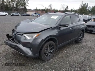 2018 Toyota RAV4 Hybrid SE with VIN JTMJJREV7JD208249, listed as a IAAI auction lot 41859301 with 91,899 mi miles and . Bid and sale history available at DreamBid. Image 2.