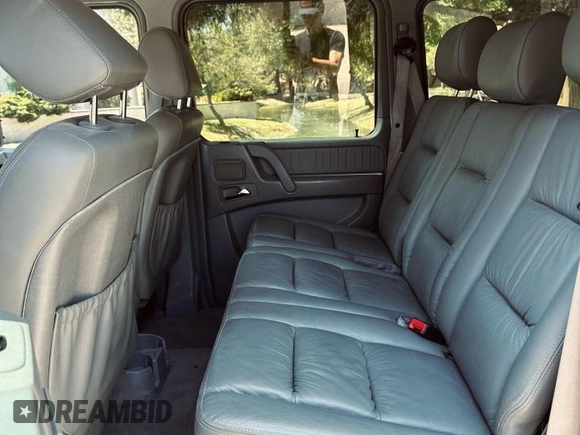 2002 Mercedes-Benz G 500 with VIN WDCYR49EX2X128555, listed as a Copart auction lot 55605995 with 225,042 mi miles and Salvage Title. Bid and sale history available at DreamBid. Image 6.