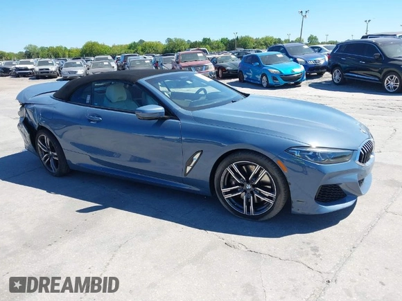 2022 BMW 8 Series 840i with VIN WBADZ4C02NCH76601, listed as a IAAI auction lot 41828172 with 23,168 mi miles. Bid and sale history available at carsss.com. Image 1.