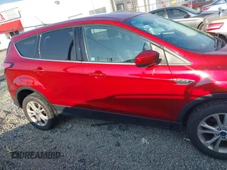 2017 Ford Escape SE z VIN 1FMCU0GD9HUF01849, wystawiony jako IAAI lot #42410230 z przebiegiem 177 423 mil mil oraz . Historia ofert i sprzedaży dostępna na DreamBid. Obrazek 13.
