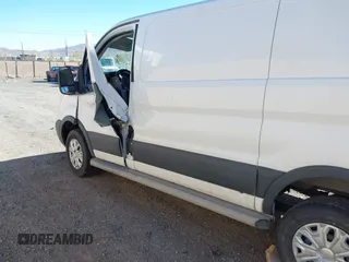 2016 Ford Transit Cargo with VIN 1FTYR1ZM9GKB20351, listed as a IAAI auction lot 38864121 with 99,365 mi miles and . Bid and sale history available at DreamBid. Image 14.