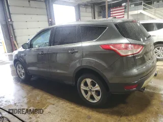 2015 Ford Escape SE with VIN 1FMCU9GX3FUB23667, listed as a Copart auction lot 52184155 with 184,954 mi miles and Salvage Title. Bid and sale history available at carsss.com. Image 2.