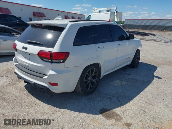 2020 Jeep Grand Cherokee Trackhawk with VIN 1C4RJFN96LC141513, listed as a IAAI auction lot 42386219 with Not provided miles and . Bid and sale history available at DreamBid. Image 4.