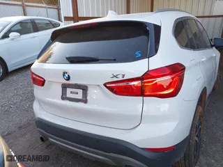 2018 BMW X1 xDrive28i with VIN WBXHT3C32J5K29627, listed as a IAAI auction lot 40995212 with 64,162 mi miles. Bid and sale history available at carsss.com. Image 16.