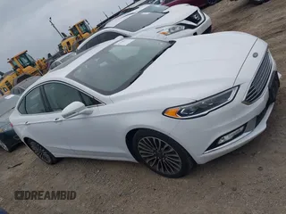 2017 Ford Fusion Titanium z VIN 3FA6P0K96HR124146, wystawiony jako IAAI lot #42428041 z przebiegiem 204 306 mil mil oraz . Historia ofert i sprzedaży dostępna na DreamBid. Obrazek 13.