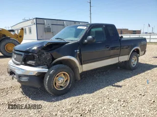 2000 Ford F-150 XL z VIN 2FTRX18L2YCA62429, wystawiony jako Copart lot #56033895 z przebiegiem 180 156 mil mil oraz Nie do naprawy • Non repairable. Historia ofert i sprzedaży dostępna na DreamBid. Obrazek 1.