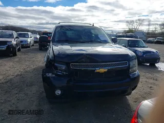 2014 Chevrolet Suburban LT with VIN 1GNSKJE71ER232700, listed as a IAAI auction lot 40812602 with 245,852 mi miles and . Bid and sale history available at DreamBid. Image 12.