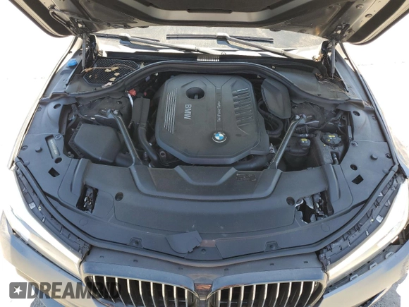 2018 BMW 7 Series 740i with VIN WBA7E2C59JG742809, listed as a Copart auction lot 66995934 with 62,017 mi miles and Salvage Title. Bid and sale history available at carsss.com. Image 12.