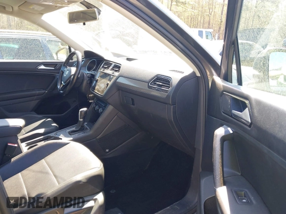 2018 Volkswagen Tiguan SEL with VIN 3VV3B7AX5JM036164, listed as a IAAI auction lot 41876403 with 108,269 mi miles and . Bid and sale history available at DreamBid. Image 5.