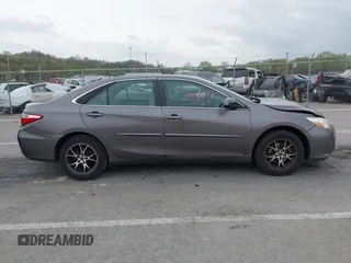 2015 Toyota Camry XLE with VIN 4T4BF1FK5FR483736, listed as a IAAI auction lot 41933106 with 104,468 mi miles. Bid and sale history available at carsss.com. Image 13.