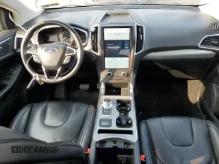 2021 Ford Edge Titanium with VIN 2FMPK4K91MBA12380, listed as a Copart auction lot 59275785 with 82,295 mi miles and Salvage title. Bid and sale history available at DreamBid. Image 8.