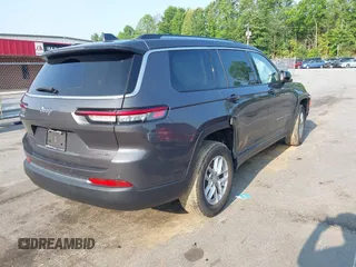 2022 Jeep Grand Cherokee Altitude with VIN 1C4RJJAG7N8630905, listed as a IAAI auction lot 42401744 with 50,455 mi miles and . Bid and sale history available at DreamBid. Image 4.
