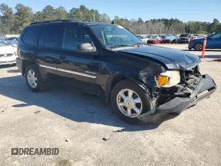 2006 GMC Envoy SLT with VIN 1GKDT13S462359008, listed as a Copart auction lot 80014324 with 158,906 mi miles and Salvage Title. Bid and sale history available at carsss.com. Image 4.
