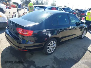 2015 Volkswagen Jetta Sedan 1.8T SE with VIN 3VWD17AJ6FM235908, listed as a IAAI auction lot 42015028 with 178,814 mi miles. Bid and sale history available at carsss.com. Image 4.