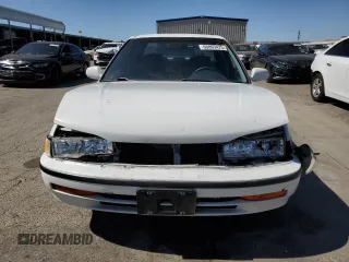 1993 Honda Accord with VIN 1HGCB7653PA144604, listed as a Copart auction lot 60893475 with 149,170 mi miles and Salvage title. Bid and sale history available at DreamBid. Image 5.