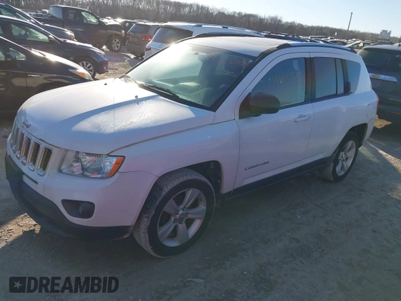 2011 Jeep Compass Latitude with VIN 1J4NT1FB9BD252816, listed as a IAAI auction lot 41455054 with 153,656 mi miles. Bid and sale history available at carsss.com. Image 2.