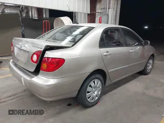 2003 Toyota Corolla CE with VIN 1NXBR32E63Z159929, listed as a IAAI auction lot 41830298 with 158,599 mi miles and . Bid and sale history available at DreamBid. Image 4.