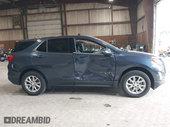 2018 Chevrolet Equinox LT z VIN 3GNAXSEV7JL367487, wystawiony jako IAAI lot #42228399 z przebiegiem 33 710 mil mil oraz . Historia ofert i sprzedaży dostępna na DreamBid. Obrazek 13.